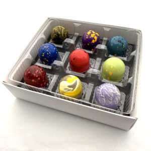A Cacao Boys custom gift box of nine hand-painted bonbons