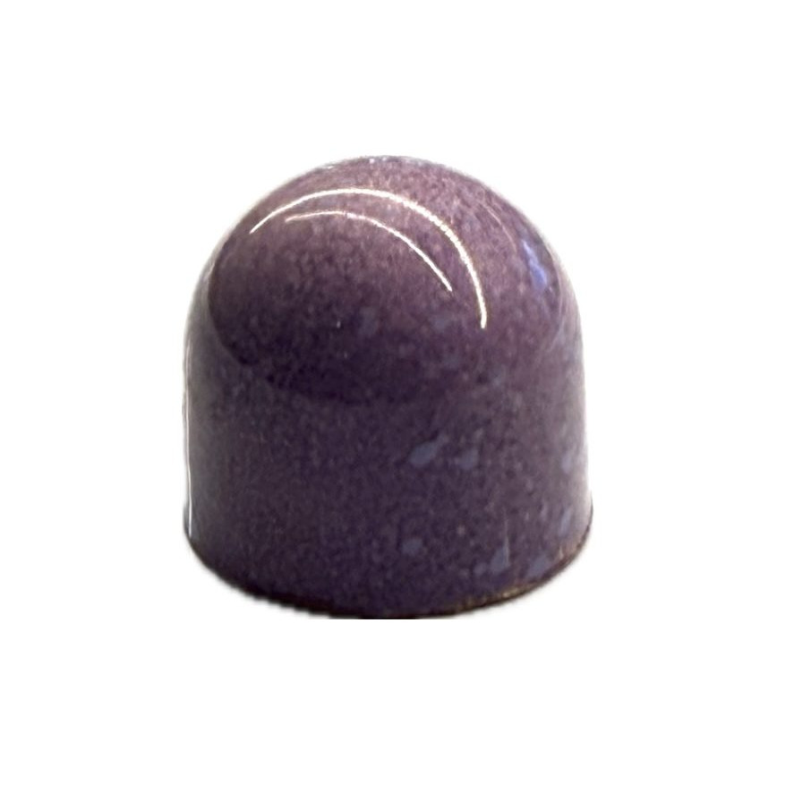 A hand-painted bonbon in speckled purple